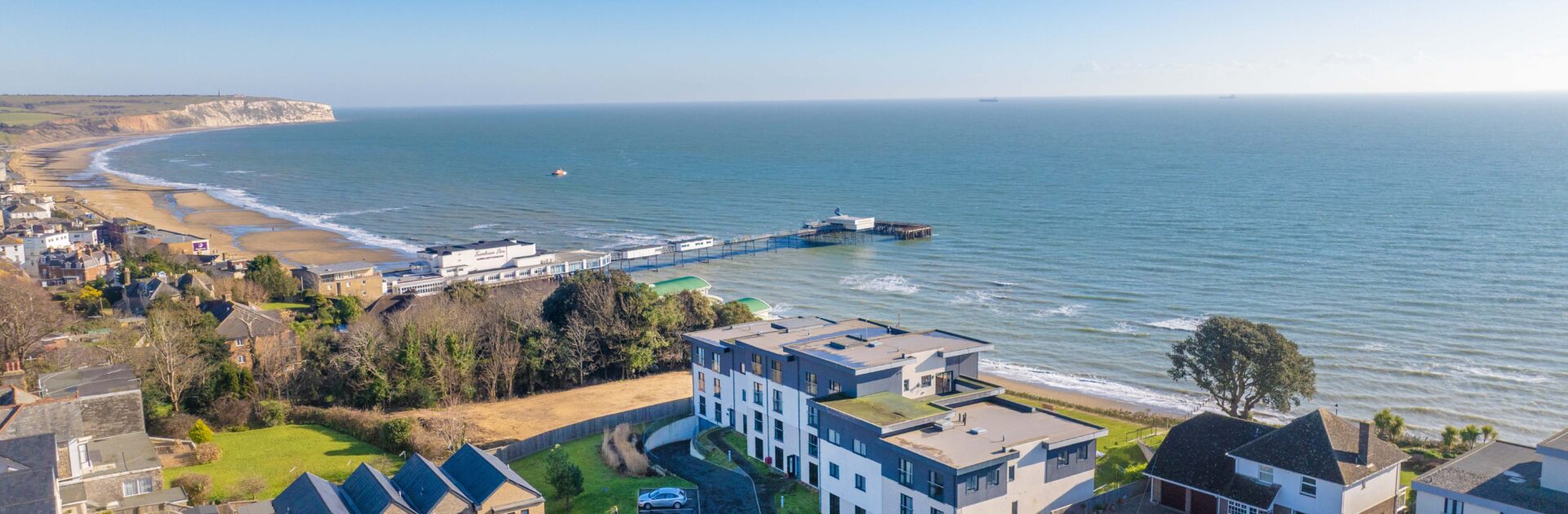 The iconic cliff-top location of Royal Cliff apartments overlooking Sandown Bay.