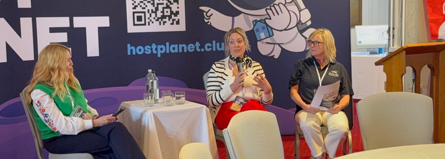 The Island Holiday Company team discussing Isle of Wight property management at the Host Planet Roadshow.