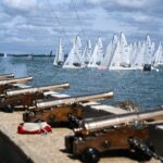 Up to 40 races take place per day across diverse boat classes, ranging from classic dayboats and Olympic-class yachts to high-tech professional ocean racers.