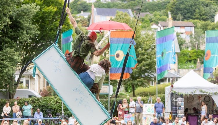 An outdoor acrobatic street performance at Ventnor Fringe during summer holidays on the Isle of Wight.