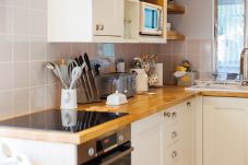 Rustic kitchen at Old Abbey Farmhouse with modern comforts and heritage charm