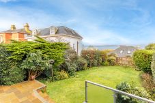 Patio of Cowes Garden Apartment overlooking the garden