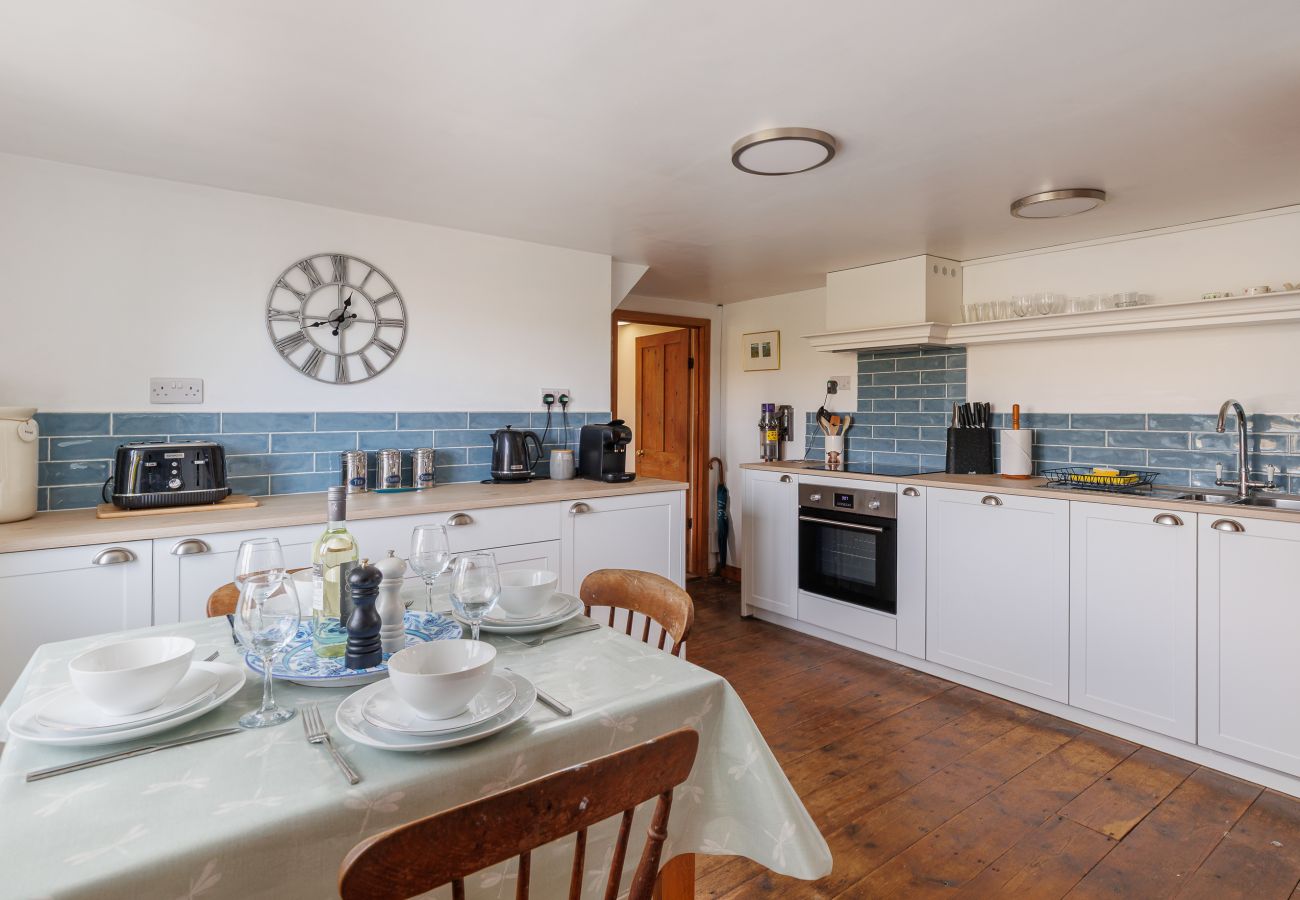 Kitchen diner at Moon Chine Cottage with countryside views on the Isle of Wight.