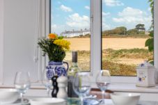 Kitchen diner at Moon Chine Cottage with beautiful countryside views on the Isle of Wight.